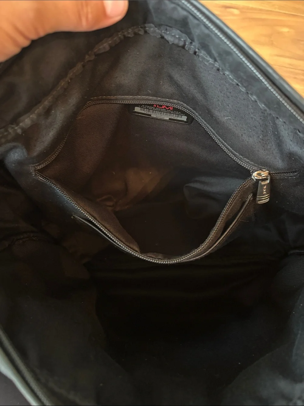 Leather Tumi messenger bag